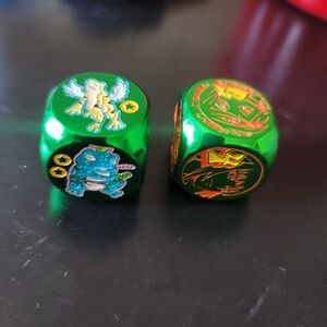 2 Green metal  Dice Set with Blue and Yellow Orange Accents